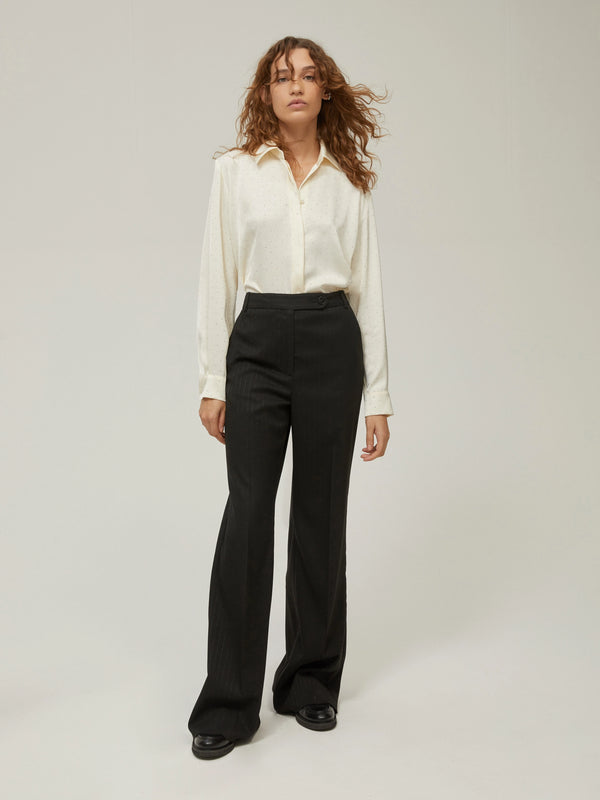 Pantaloni gessati con paillettes